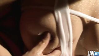 Satomi Suzuki's pussy oiled up and teased with a toy